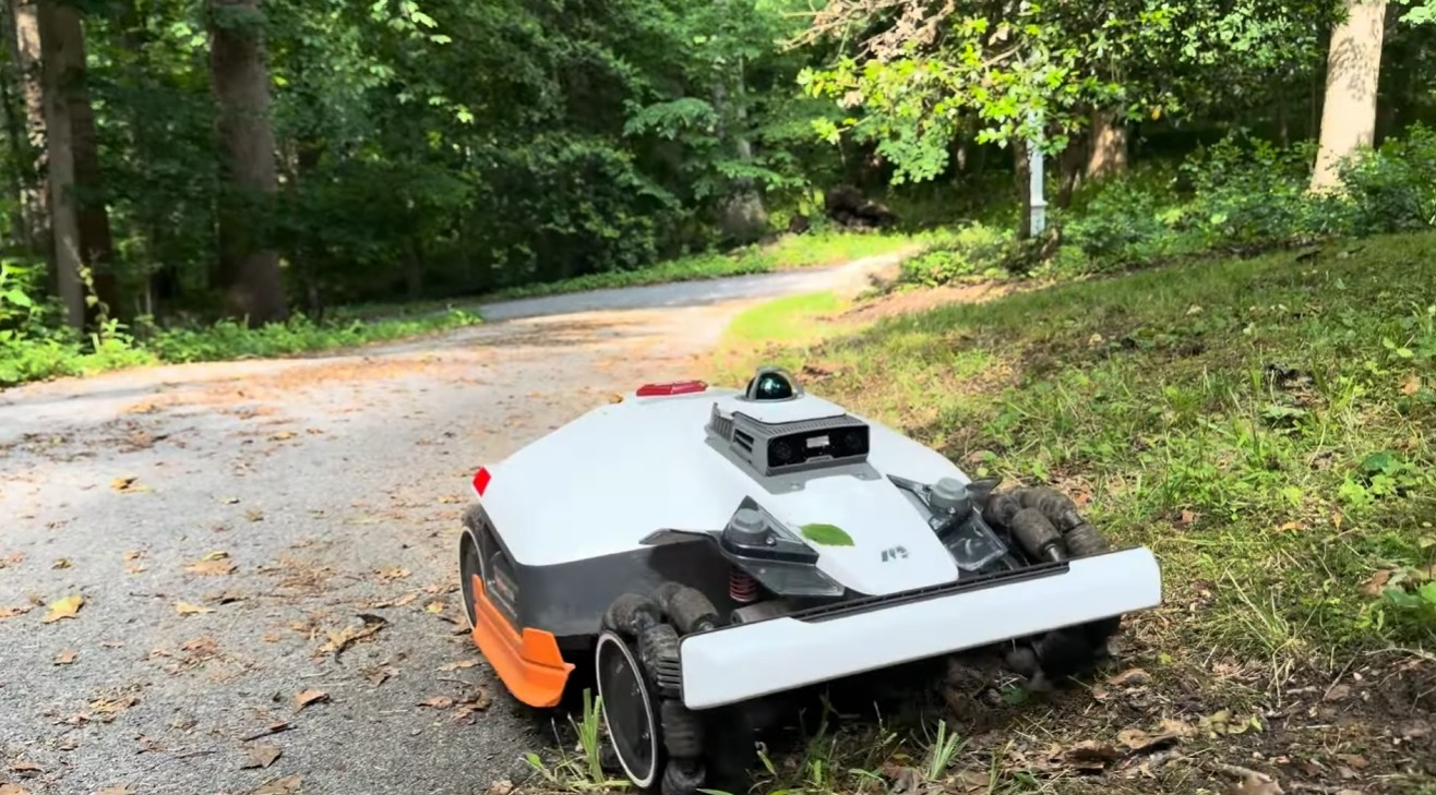 A LiDAR robot mower on a wooded property