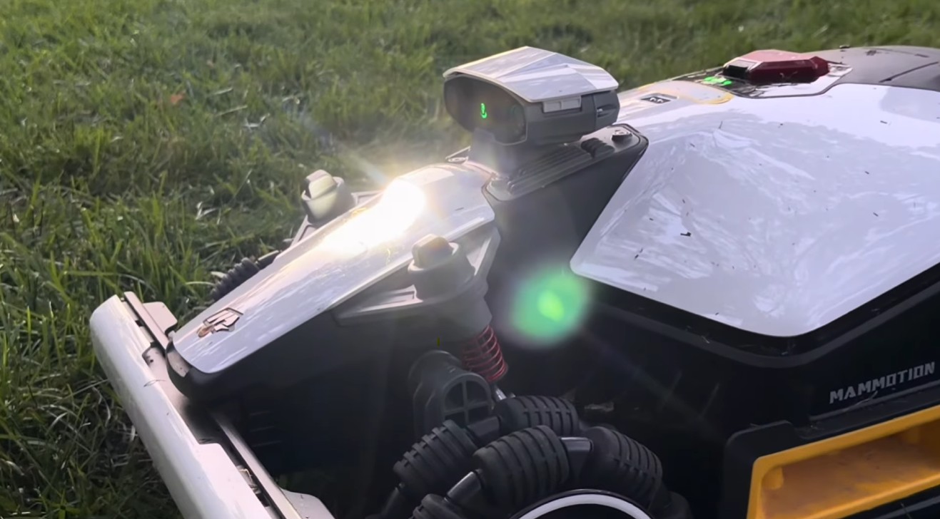 Mammotion LUBA 3 AWD with its 360-degree LiDAR dome and headlight, the hardware behind the new firmware features