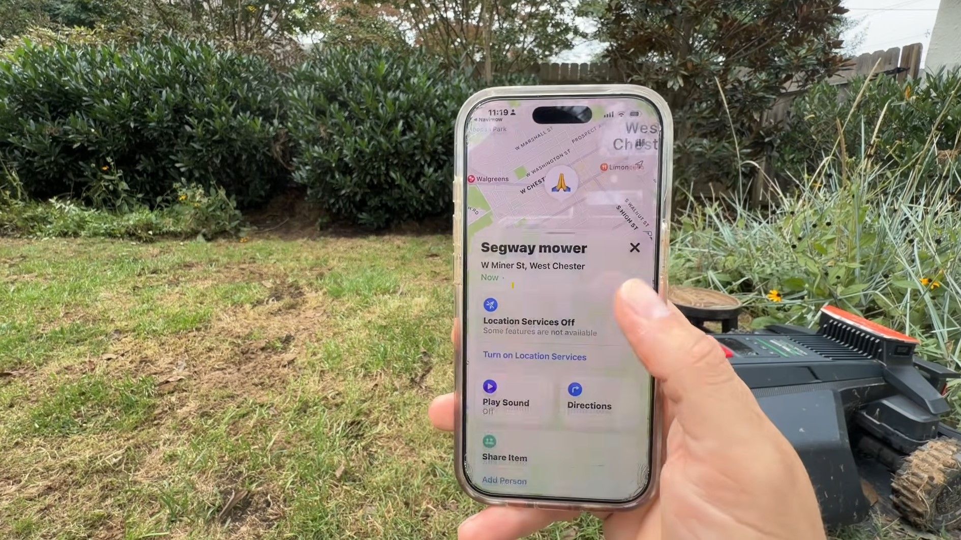 An iPhone showing a Segway Navimow mower located on W Miner St in West Chester in the Apple Find My app