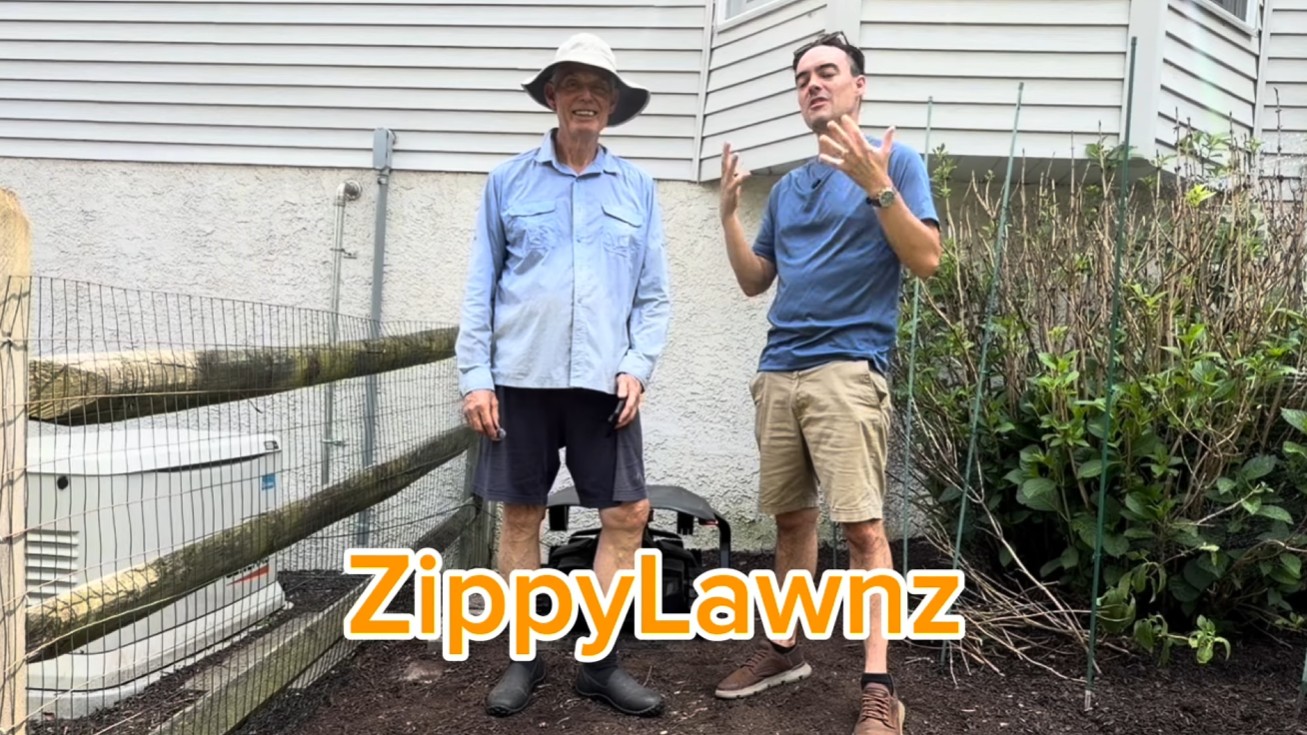 A West Chester homeowner talking with the Zippy Lawnz team about his Navimow X430 after a month